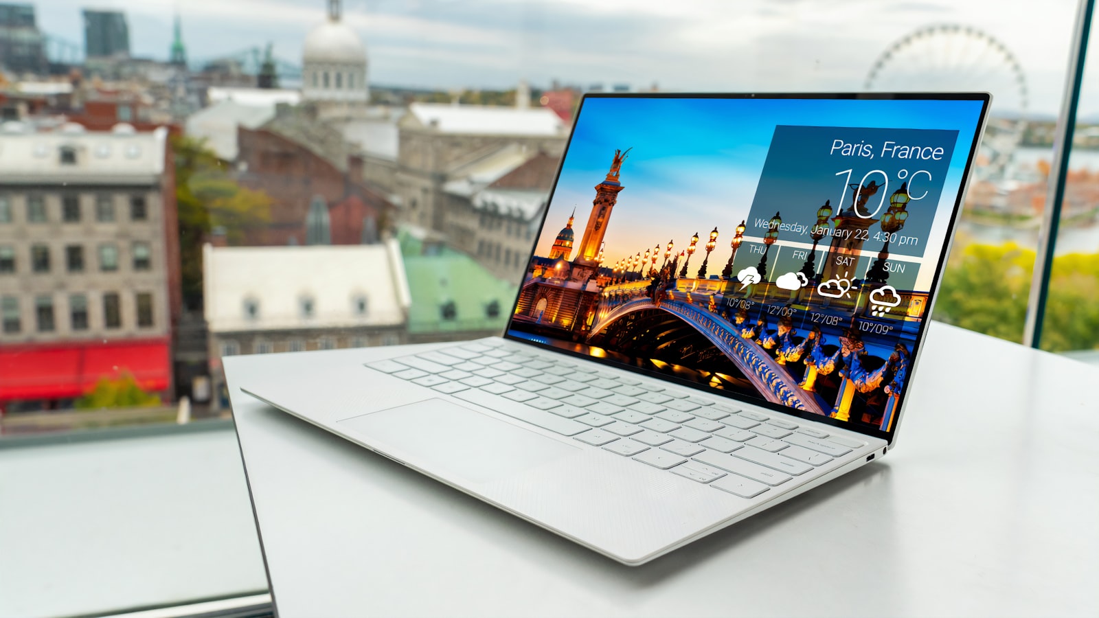 A laptop and external drive on a desk representing safe data backups
